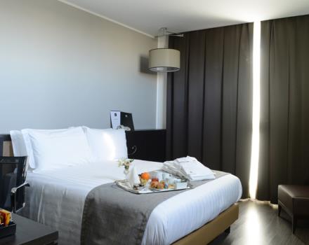 Discover the comfortable rooms at the Best Western Premier CHC Airport in Genoa
